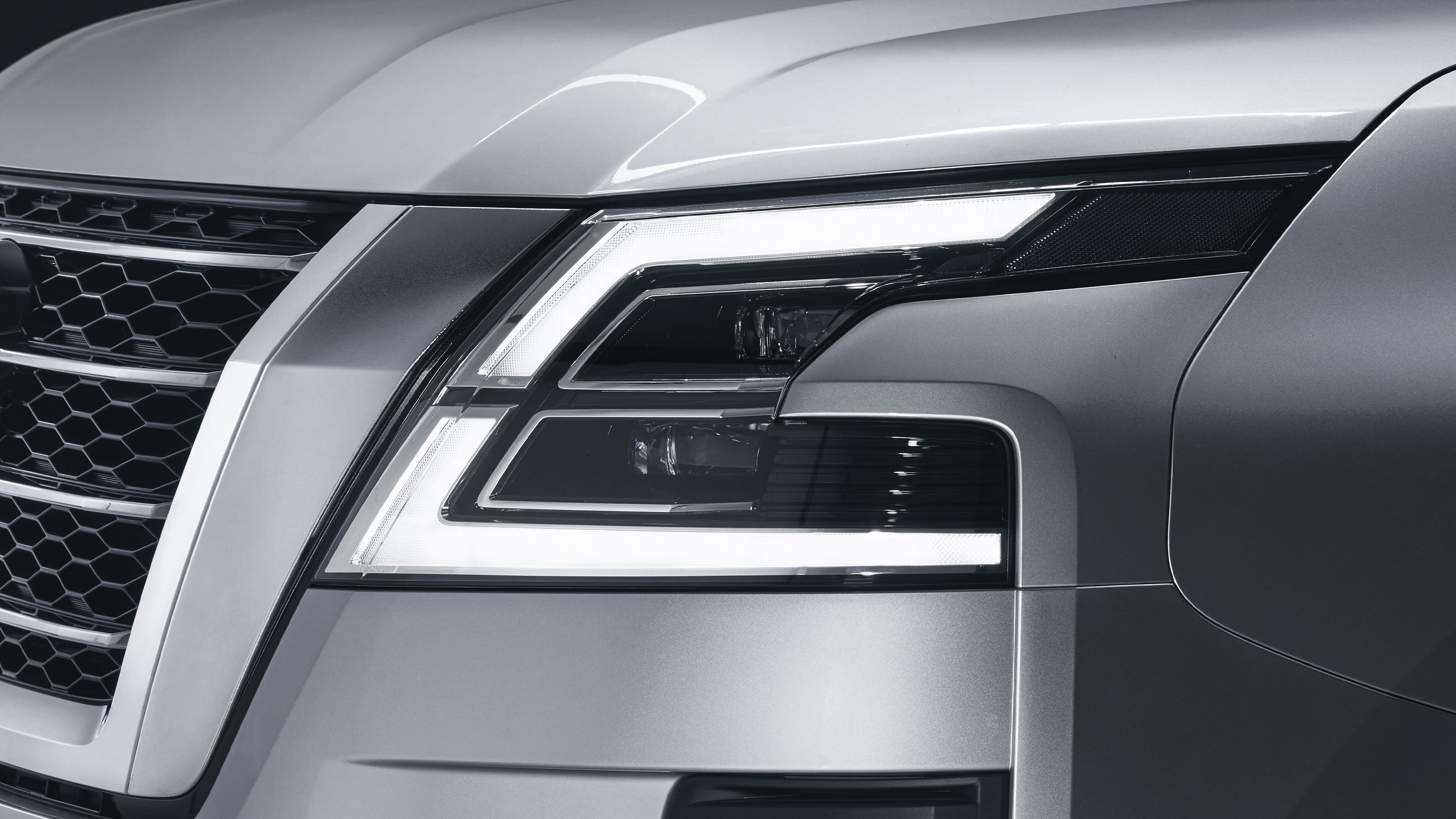 https://gcc-1307444343.cos.accelerate.myqcloud.com/images/14034b/r_960x540/generations/generation_649947d05a257_nissan-patrol-exterior-headlight.jpg