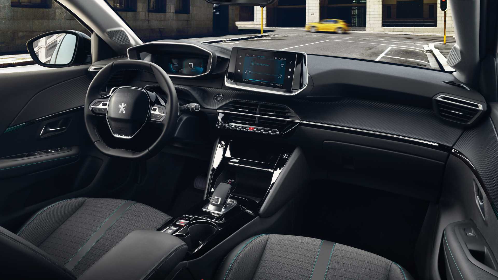 https://gcc-1307444343.cos.accelerate.myqcloud.com/images/212978/r_960x540/generations/generation_6494388ec0ba4_peugeot-208-interior-cockpit.jpg