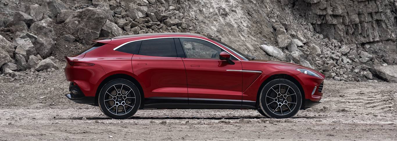 https://gcc-1307444343.cos.accelerate.myqcloud.com/images/a725c2/r_960x540/generations/generation_6495a92243b2c_aston-martin-dbx-exterior-side-profile.jpg
