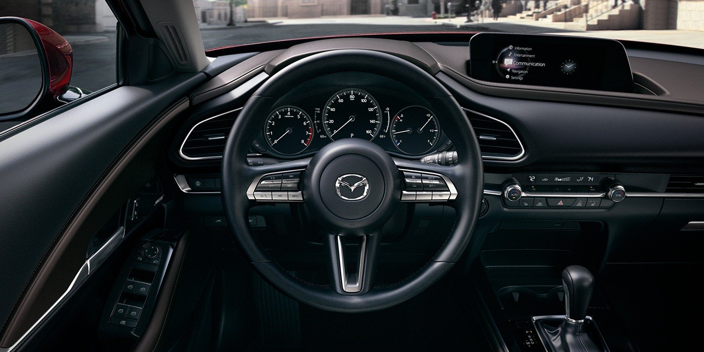 https://gcc-1307444343.cos.accelerate.myqcloud.com/images/bc47e0/r_960x540/generations/generation_64a7a14874109_mazda-cx-30-interior-cockpit.jpg
