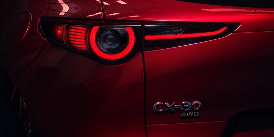 https://gcc-1307444343.cos.accelerate.myqcloud.com/images/e0d81e/r_960x540/generations/generation_64a7a1485449f_mazda-cx-30-exterior-tail-light.jpg