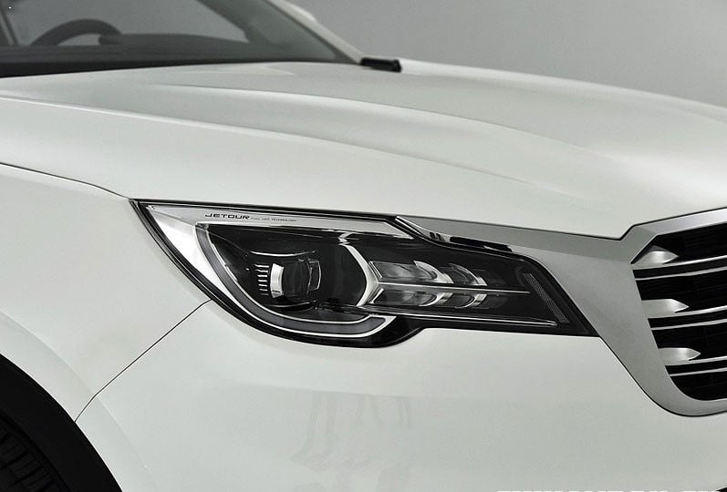 https://gcc-1307444343.cos.accelerate.myqcloud.com/images/fb76d0/r_960x540/generations/generation_64a7bdba73638_jetour-x70-exterior-headlight.jpg