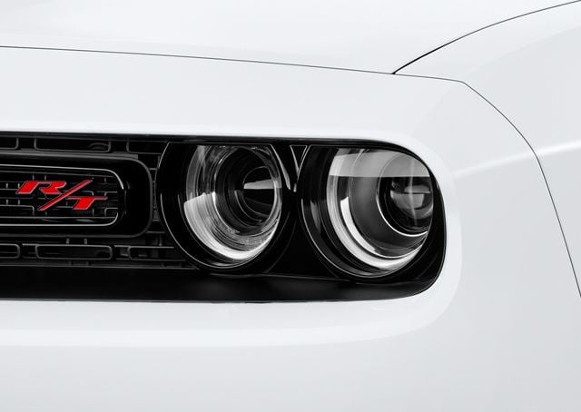 https://gcc-1307444343.cos.accelerate.myqcloud.com/images/fcad72/r_960x540/generations/generation_64a3143cc337a_dodge-challenger-exterior-headlight.jpg