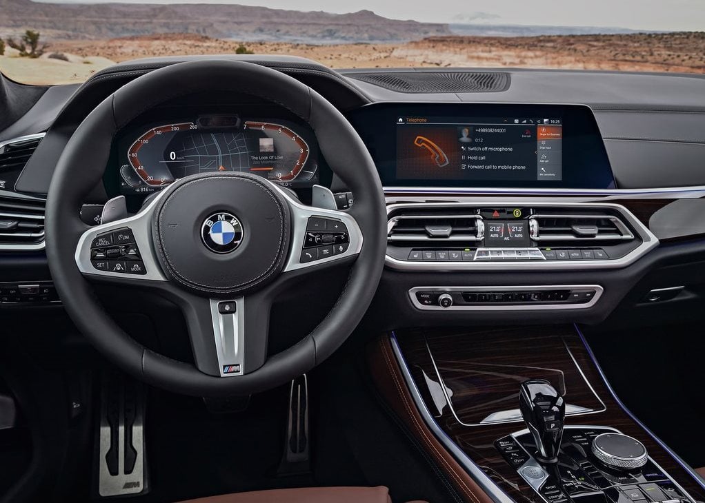 https://gcc-1307444343.cos.accelerate.myqcloud.com/images/fdee15/r_960x540/generations/generation_64a11ff18e64a_bmw-x5-interior-steering-wheel.jpg